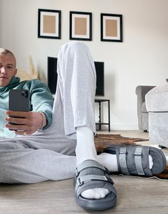 Серые шлепанцы с внутренней отделкой из искусственного черного меха ASOS DESIGN-Серый
