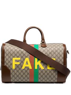 Gucci дорожная сумка с принтом Fake/Not