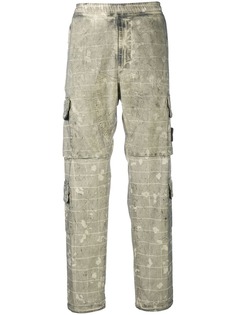 Stone Island брюки карго с камуфляжным принтом