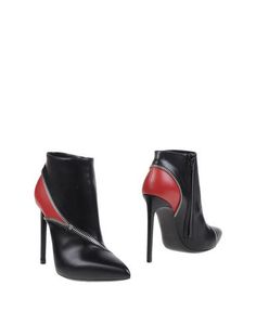 Полусапоги и высокие ботинки Saint Laurent