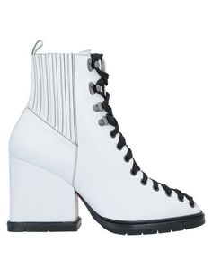 Полусапоги и высокие ботинки Santoni