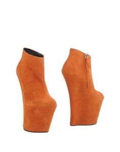 Полусапоги и высокие ботинки Giuseppe Zanotti