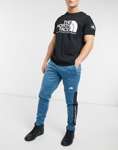 Синие джоггеры с логотипом и манжетами The North Face Train N-Синий