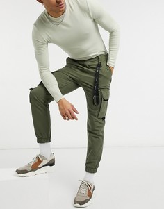 Брюки-карго цвета хаки с черной отделкой Bershka-Зеленый