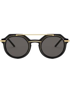Dolce & Gabbana Eyewear солнцезащитные очки Slim в круглой оправе