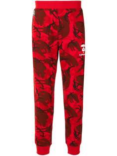 AAPE BY *A BATHING APE® спортивные брюки с камуфляжным узором