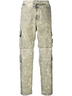 Stone Island брюки карго с камуфляжным принтом