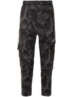 AAPE BY *A BATHING APE® брюки карго с камуфляжным принтом