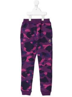 A BATHING APE® спортивные брюки с камуфляжным принтом Bape