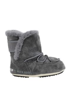 Полусапоги и высокие ботинки Moon Boot