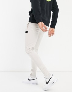 Серые узкие джоггеры с логотипом из флока The Couture Club-Серый
