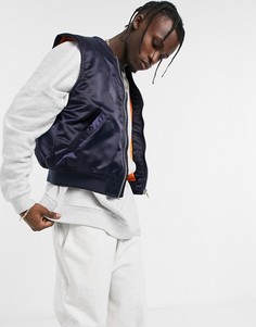 Темно-синий дутый жилет с контрастной оранжевой подкладкой ASOS DESIGN