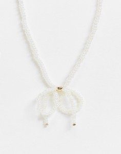 Белое короткое ожерелье из искусственного жемчуга с бантиком Monki Harper-Белый