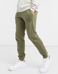 Зеленые спортивные штаны с манжетами и круглым логотипом Jack & Jones Originals-Зеленый цвет