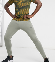 Суженные книзу джоггеры цвета хаки Nike Training Tall Dry-Зеленый цвет