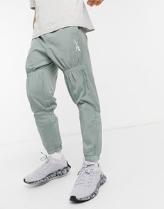 Тканые спортивные штаны цвета хаки на шнурке Reebok-Зеленый цвет