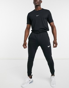 Черные суженные книзу флисовые джоггеры из ткани Dri-Fit Nike Training-Черный цвет