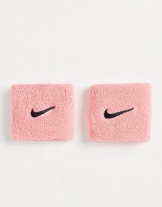 Розовые напульсники с логотипом-галочкой Nike-Розовый цвет