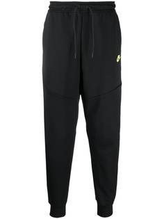 Nike зауженные спортивные брюки с логотипом Swoosh