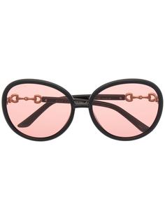 Gucci Eyewear солнцезащитные очки Jackie в круглой оправе с декором Horsebit