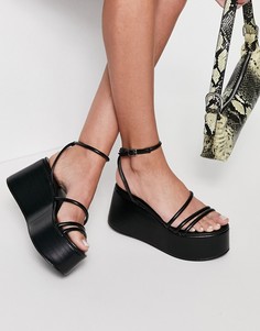 Черные сандалии на массивной подошве Schuh Sabrina-Черный цвет