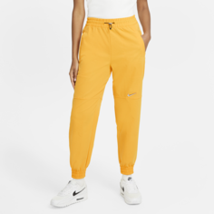 Женские брюки из тканого материала Nike Sportswear Swoosh - Желтый