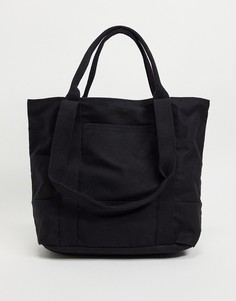 Черная oversized сумка-тоут из плотной ткани из органического хлопка с ручкой и длинным ремешком ASOS DESIGN-Черный цвет