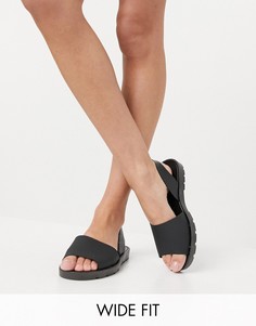 Черные резиновые сандалии для широкой стопы на плоской подошве с ремешком через пятку London Rebel-Черный цвет