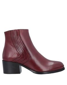 Полусапоги и высокие ботинки Calpierre