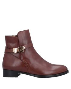 Полусапоги и высокие ботинки Calpierre