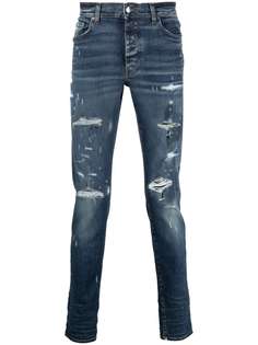 AMIRI джинсы скинни с эффектом потертости