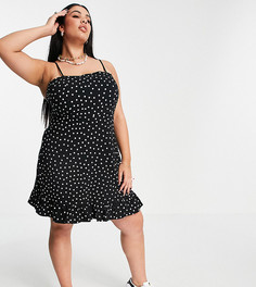 Черный сарафан в белый горошек на бретельках с баской ASOS DESIGN Curve
