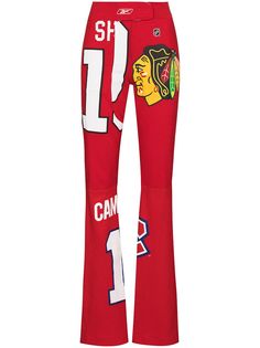 Conner Ives расклешенные брюки с графичным принтом