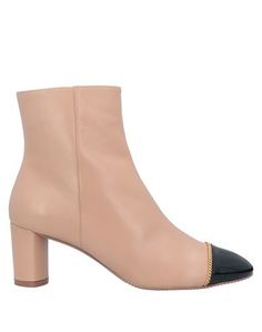 Полусапоги и высокие ботинки Stuart Weitzman