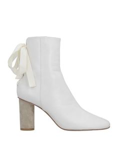 Полусапоги и высокие ботинки Loewe