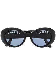 Chanel Pre-Owned солнцезащитные очки в овальной оправе с логотипом CC