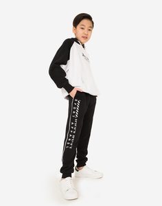 Чёрные спортивные брюки-джоггеры с принтом для мальчика Gloria Jeans