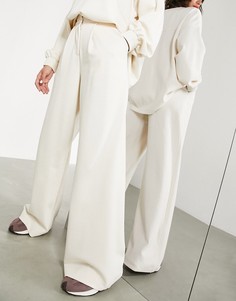 Кремовые брюки с завышенной талией из фактурного трикотажа ASOS EDITION-Белый