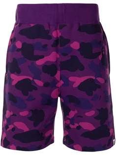 A BATHING APE® camouflage-print track shorts