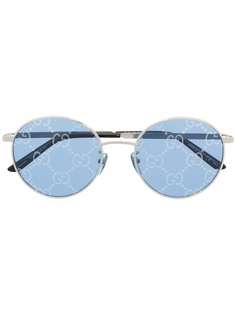 Gucci Eyewear солнцезащитные очки в круглой оправе с логотипом GG