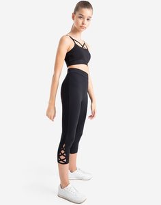 Укороченные чёрные леггинсы с перфорацией для девочки Gloria Jeans