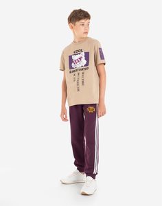Бордовые спортивные брюки с лампасами и принтом для мальчика Gloria Jeans