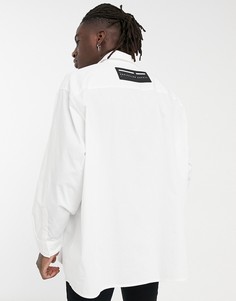 Белая поплиновая рубашка в стиле super oversized с прорезиненной нашивкой и логотипом ASOS Unrvlld Spply-Белый