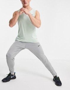 Серые джоггеры Nike Pro Training-Серый