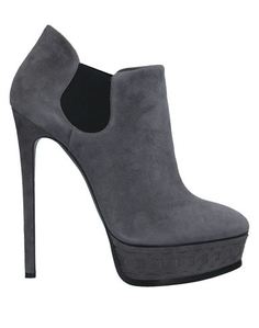 Полусапоги и высокие ботинки Casadei