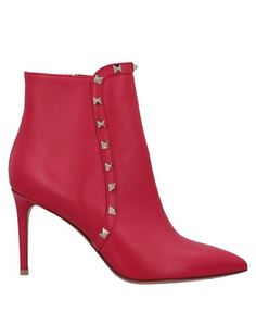 Полусапоги и высокие ботинки Valentino