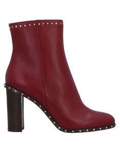 Полусапоги и высокие ботинки Valentino