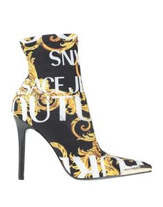 Полусапоги и высокие ботинки Versace