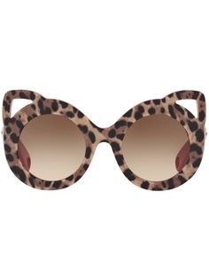 Dolce & Gabbana Eyewear солнцезащитные очки в круглой оправе с леопардовым принтом
