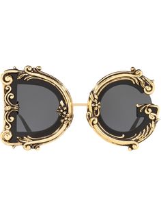 Dolce & Gabbana Eyewear солнцезащитные очки Devotion в круглой оправе